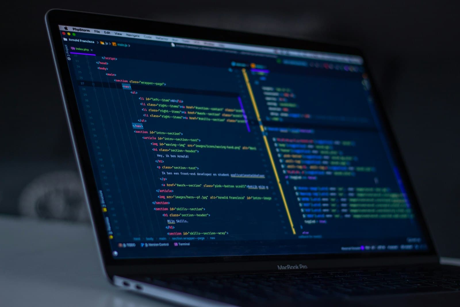 Source code displayed on a monitor in a dark room